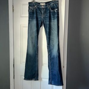 Big distress jeans. Very tall girl friendly.